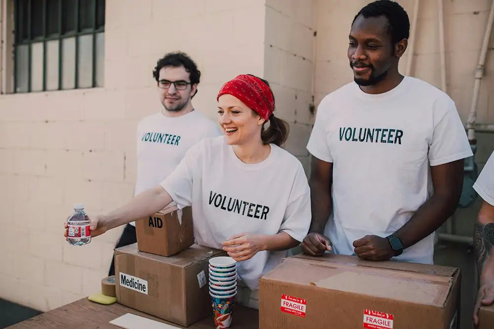 Volunteers serving together